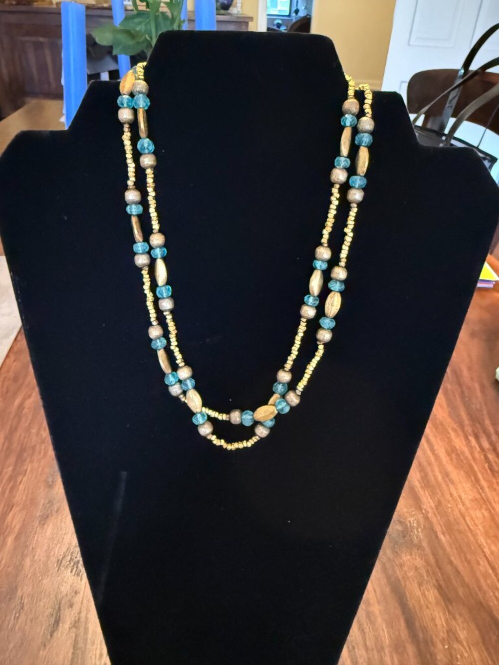 Etruscan 32" beaded necklace with gold and bronze beads and Emerald beads